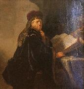 REMBRANDT Harmenszoon van Rijn A Scholar Seated at a Desk Spain oil painting artist